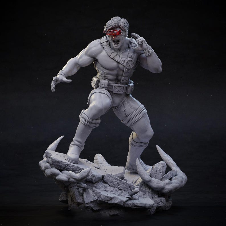 May include: A gray, 3D-printed figurine of a muscular superhero in a dynamic pose. The figure wears a costume with straps and a belt, and has a red visor. The base is a rocky terrain.