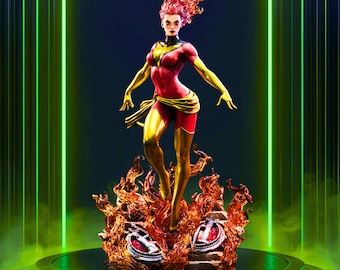May include: A statue of a female superhero in a dynamic pose, clad in a red and gold costume. The figure stands atop a fiery base, with flames and smoke effects. The statue has a detailed design and is set against a green neon background.