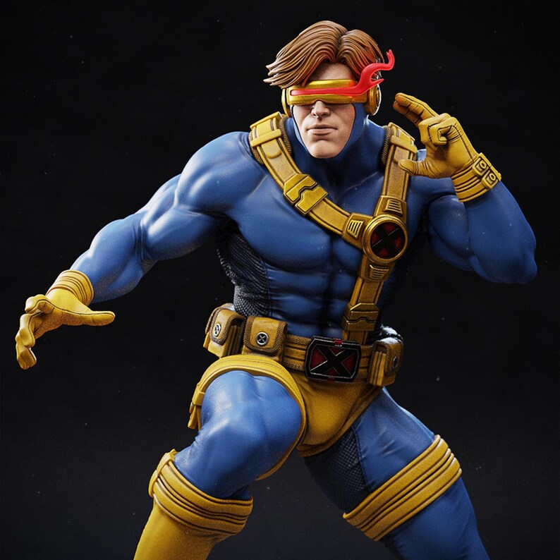 May include: A detailed figurine of a superhero in a dynamic pose. The figure is clad in a blue and yellow costume, complete with a belt, gloves, and boots. The character has brown hair and a red visor. The overall aesthetic is reminiscent of a comic book.