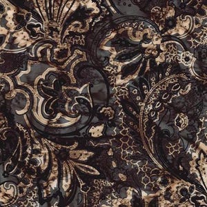 May include: A close-up of a fabric with a dark, ornate paisley pattern. The design features swirling floral and leaf motifs in shades of brown, tan, and gray, creating a rich, textured appearance. The fabric has a vintage or antique aesthetic.