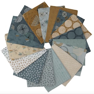 May include: A collection of fabric swatches arranged in a circular fan pattern. The pieces feature various patterns including dandelion-like line drawings, geometric circles, and small floral motifs in a color palette of slate blue, tan, and cream.