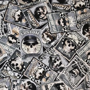 May include: A fabric pattern featuring numerous rectangular patches with skull and motorcycle-themed graphics. The patches are primarily black, white, and gray, with text such as "Custom Motorcycles" and "Classic" displayed. The design has a vintage, biker aesthetic.