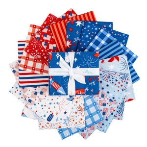 May include: A collection of patriotic fabric squares in red, white, and blue. The fabric features patterns of fireworks, flags, stars, and stripes. A square bundle is tied with a white ribbon. The fabrics are arranged in a circular pattern.