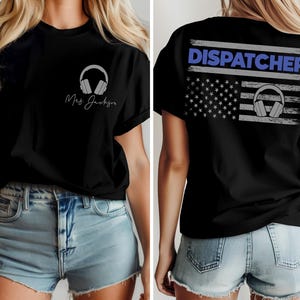 May include: Black t-shirt with a white outline of headphones and the text "Mrs. Jackson" on the front. The back of the shirt features a distressed American flag with a white outline of headphones and the text "DISPATCHER" above the flag.