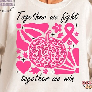 Peut inclure: Sweat-shirt blanc avec un motif graphique rose repr&eacute;sentant une citrouille &agrave; imprim&eacute; l&eacute;opard, un ruban rose et le texte "Ensemble nous luttons, ensemble nous gagnons".
