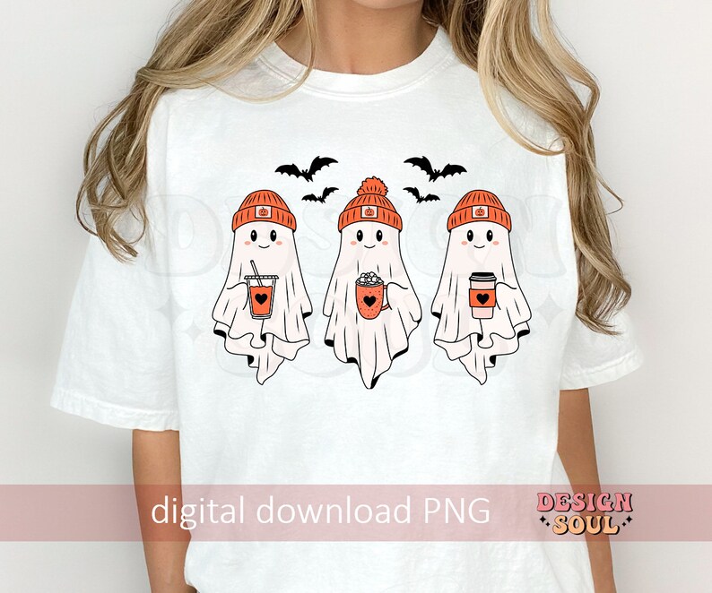 May include: White t-shirt featuring three cartoon ghosts wearing orange beanies and holding beverages. The ghosts have smiling faces and are accompanied by black bat silhouettes. The text "digital download PNG" is visible.