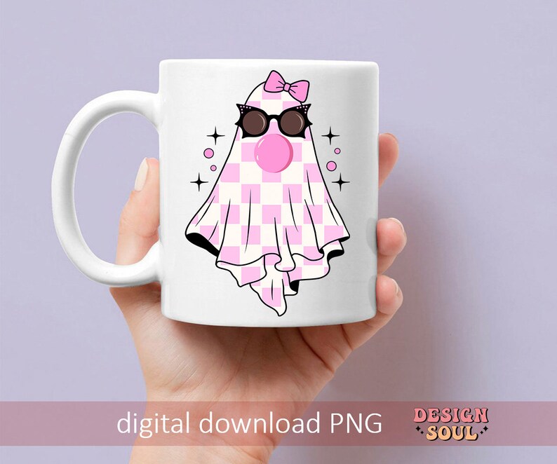 May include: A white ceramic mug with a pink and white checkered ghost wearing pink sunglasses and a pink bow. The ghost has a pink bubble coming out of its mouth. The mug has a black outline and the text "digital download PNG" and "DESIGN SOUL" in pink.