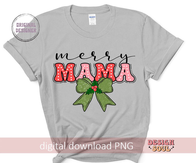 May include: A gray t-shirt with the text "merry mama" in red and pink letters with white polka dots. A green bow with red berries and green leaves is below the text.