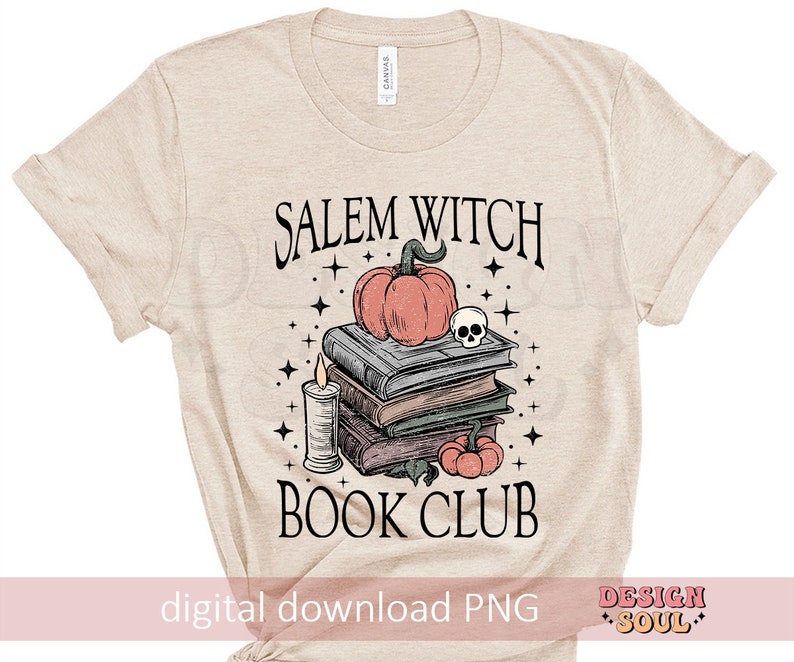 May include: A beige t-shirt with the text "Salem Witch Book Club" printed on it. The design features a stack of books, a pumpkin, a skull, and a candle.