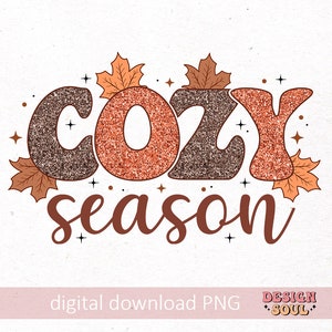 May include: A digital graphic with the words "COZY season" in brown and orange glitter text, surrounded by autumn leaves and stars. The words "digital download PNG" and the Design Soul logo are at the bottom.