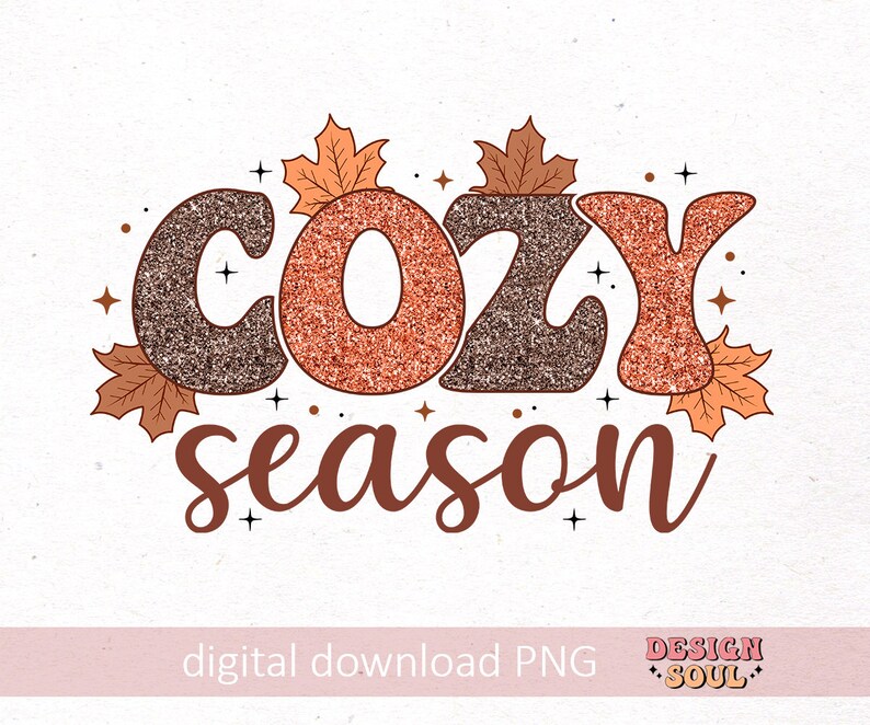 May include: A digital graphic with the words "COZY season" in brown and orange glitter text, surrounded by autumn leaves and stars. The words "digital download PNG" and the Design Soul logo are at the bottom.