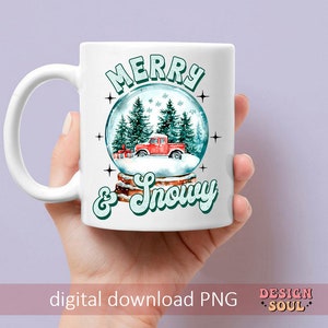 May include: White ceramic mug featuring a green and white snow globe design. The snow globe depicts a red truck and pine trees. The text "Merry & Snowy" is written in a retro font.