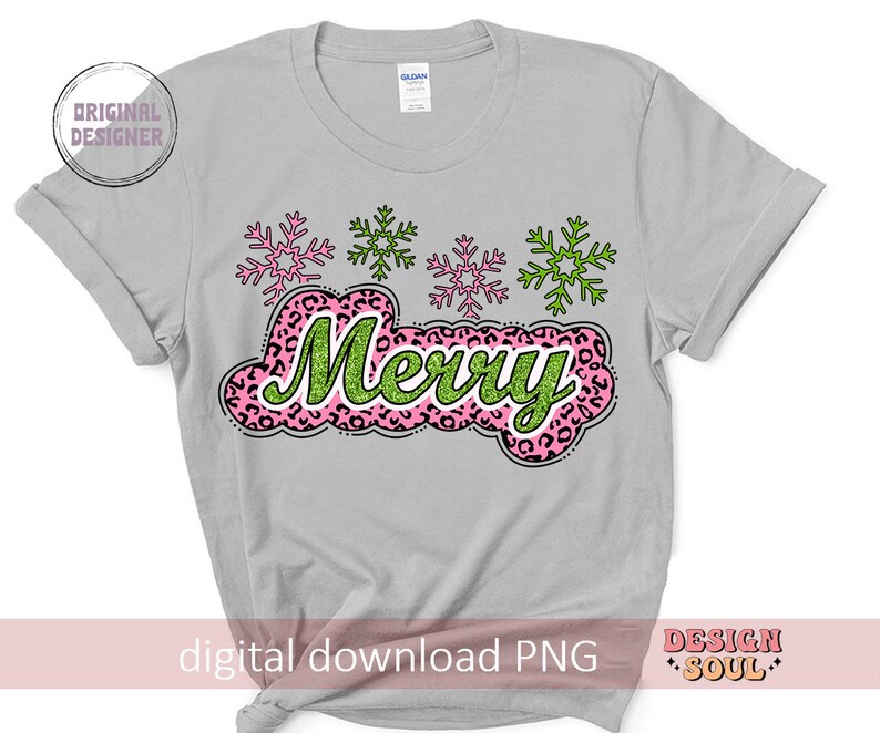 May include: A grey t-shirt with a pink and green "Merry" design featuring snowflakes. The text is in a glittery font and the snowflakes are pink and green.