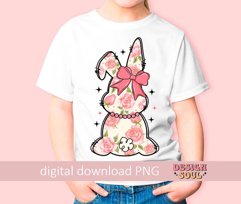 May include: A white t-shirt with a pink floral bunny graphic. The bunny has a pink bow and is outlined in black. The text "digital download PNG" and "Design Soul" are at the bottom of the image.
