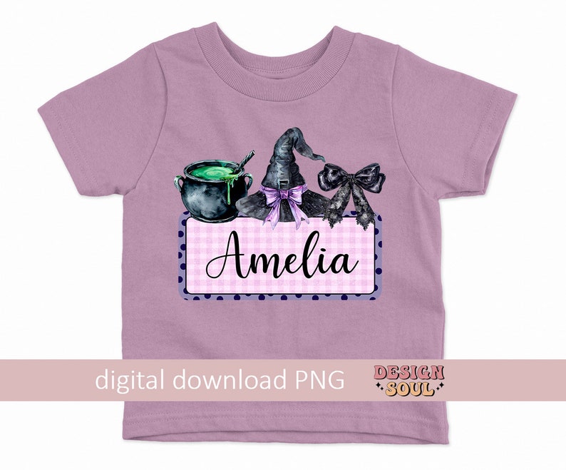 May include: A purple t-shirt with a witch hat, cauldron, and a pink and white gingham sign that says "Amelia".