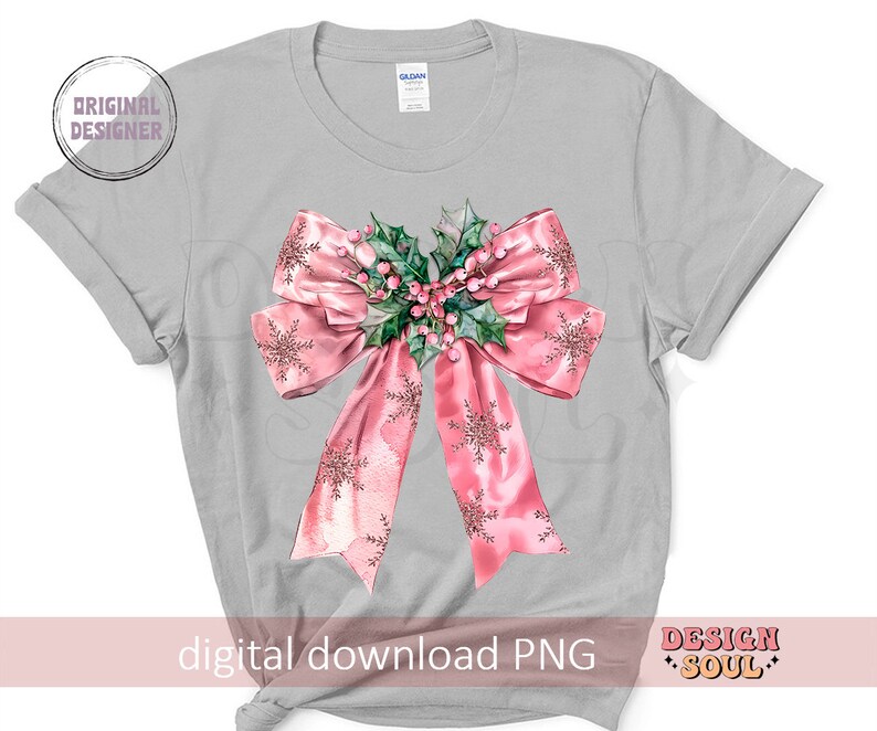 May include: A gray t-shirt with a pink bow with a green holly and red berry design. The bow has a snowflake pattern.