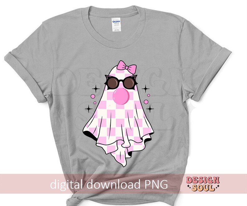May include: A gray t-shirt with a pink and white checkered ghost wearing sunglasses and a pink bow. The ghost has a pink bubble coming out of its mouth. The text "digital download PNG" is at the bottom of the shirt.