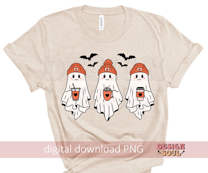 May include: Beige t-shirt featuring three cartoon ghosts wearing orange beanies with pumpkin designs. Each ghost holds a beverage, including coffee and a pumpkin spice drink. Black bats fly above the ghosts. The text "digital download PNG" is at the bottom.