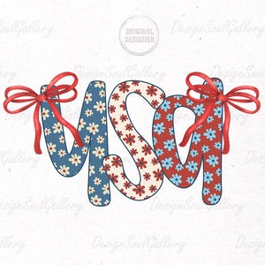 May include: USA spelled out in red, white, and blue patterned letters with red bows on each side of the letters.
