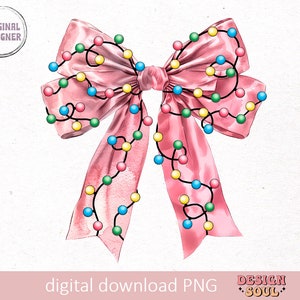May include: A pink satin bow with a string of colorful lights wrapped around it. The lights are blue, green, yellow, and pink.