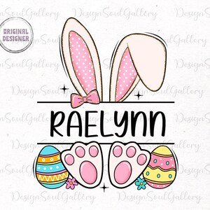 May include: A personalized Easter bunny design with the name "Raelynn" in black text. The bunny has pink ears with white polka dots, a pink bow, and white paws. The design is surrounded by colorful Easter eggs.