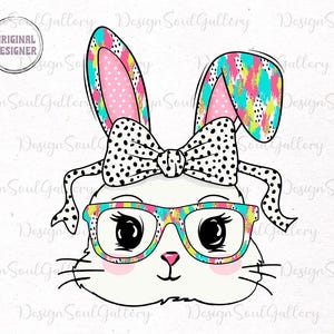 May include: A white bunny with pink ears and a black and white polka dot bow. The bunny is wearing colorful glasses and has a pink nose.