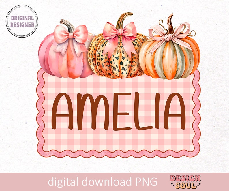 May include: A pink and white checkered sign with the name Amelia written in brown letters. Three pumpkins are above the sign, one is pink, one is orange and white, and one is orange with a leopard print.
