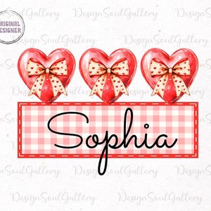 May include: A personalized Valentine's Day design featuring three red hearts with white polka dots and bows. The hearts are arranged above a pink and white gingham background with the name "Sophia" written in black cursive.