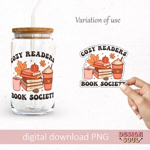 May include: A digital download of a sticker design featuring a stack of books, a pumpkin, a cup of coffee, and candles with the text "Cozy Readers Book Society".