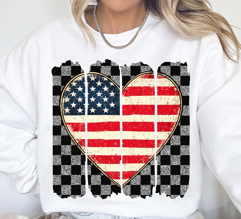May include: White sweatshirt with a distressed American flag heart design on a checkered background.