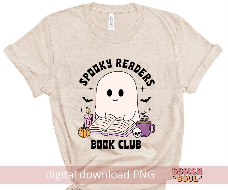 May include: A beige t-shirt with a spooky reader book club design. The design features a ghost reading a book, a pumpkin, a candle, and a cup of coffee. The text "Spooky Readers Book Club" is in black.