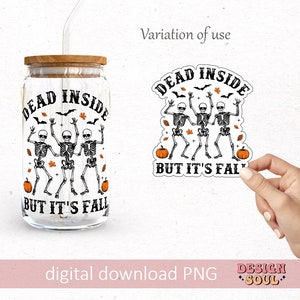 May include: A clear glass can-shaped cup with a bamboo lid and straw, featuring a Halloween-themed design. The design includes dancing skeletons, bats, and pumpkins, with the text "DEAD INSIDE BUT IT'S FALL". A matching sticker is also shown.