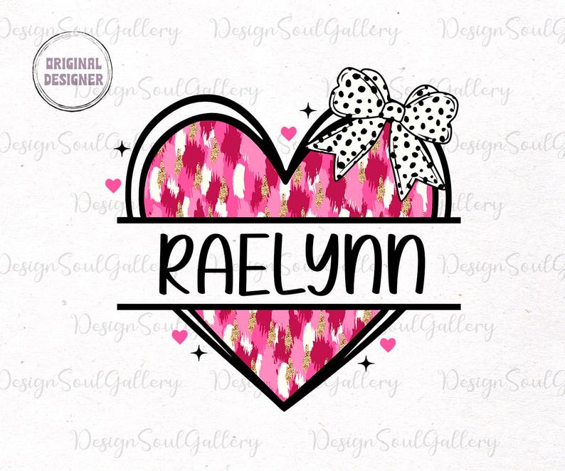 May include: A pink and gold heart with a black outline and a black and white polka dot bow on top. The name "RAELYNN" is written in black letters below the heart.