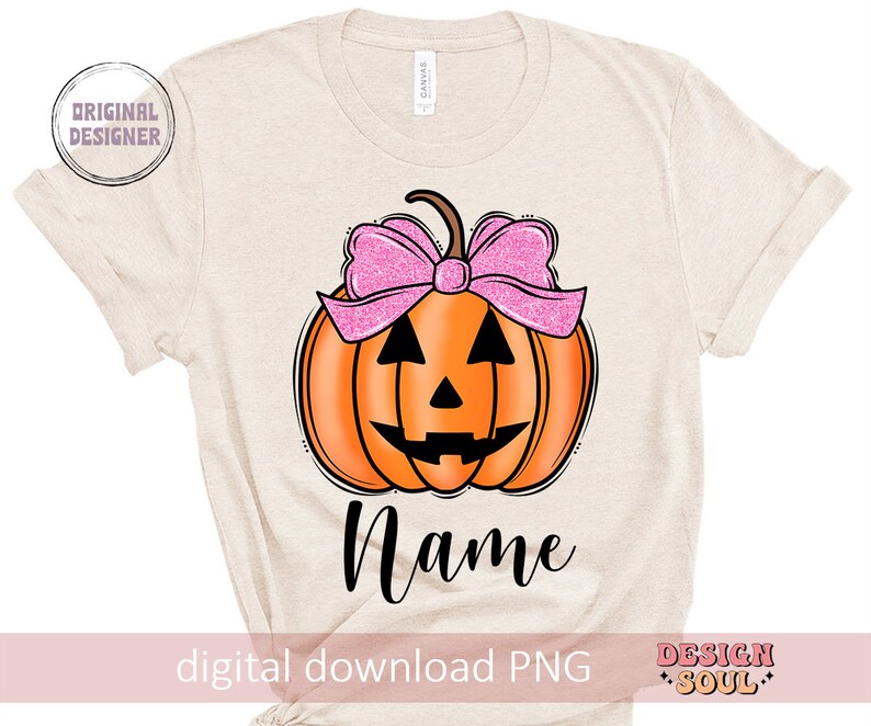 May include: A beige t-shirt with a pumpkin with a pink bow and the word "Name" printed on it. The shirt is a digital download PNG file.