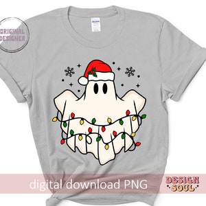 May include: A gray t-shirt with a white ghost wearing a red Santa hat and surrounded by colorful Christmas lights. The text "digital download PNG" is at the bottom of the shirt.