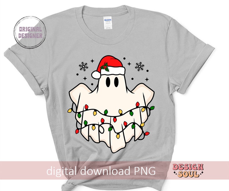 May include: A gray t-shirt with a white ghost wearing a red Santa hat and surrounded by colorful Christmas lights. The text "digital download PNG" is at the bottom of the shirt.