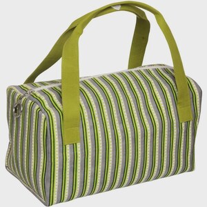 May include: A rectangular duffel bag with vertical stripes in gray, green, and white. The bag has lime green handles and a white zipper. The bag is designed for carrying items and has a simple, yet stylish design.