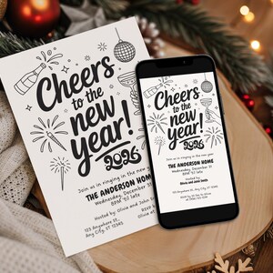 May include: A black smartphone and a white invitation card with the text "Cheers to the new year! 2026". The invitation includes fireworks, champagne bottles, and a disco ball illustration. The phone displays the same design.