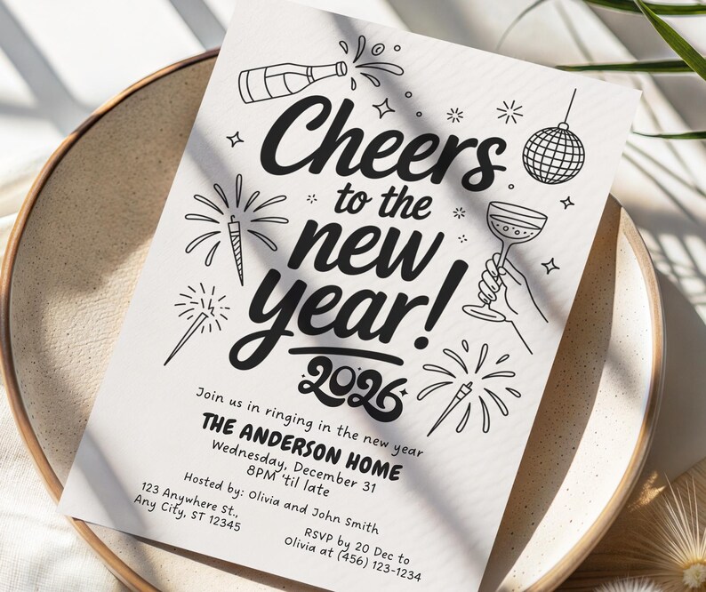 May include: A black and white New Year's invitation with the text "Cheers to the new year! 2026." The design includes illustrations of fireworks, a champagne bottle, a disco ball, and a champagne glass. The invitation is on a white paper.