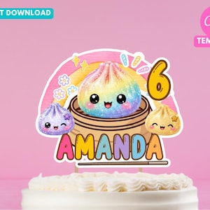 May include: A cake topper featuring a rainbow-coloured dumpling in a bamboo steamer, a purple dumpling, a yellow dumpling, the number 6, and the name AMANDA in colourful letters. The design includes a rainbow arch, small flowers, and sparkles.