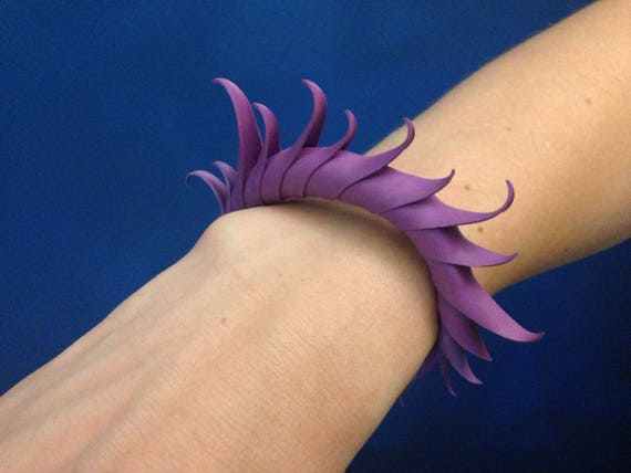 Multiplume Bracelet with short soft spikes