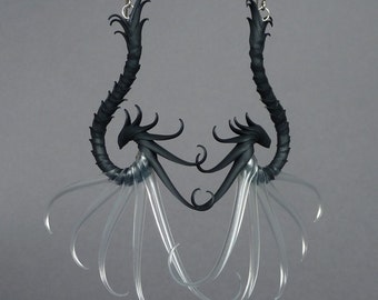 Anisopteroid Large Swoop Earrings with soft translucent spines