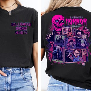 May include: Black t-shirt with the text "HALLOWEEN HORROR NIGHTS" in pink and purple. The back of the shirt features a pink skull and images of horror movie characters.