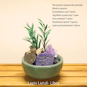 May include: A green ceramic bowl containing a DIY assembly kit with a Libra constellation card, 50g of white crystal chips, a 2cm amethyst, three dried flower plants, and one Lapis Lazuli stone. The text reads: The product requires diy assembly.
