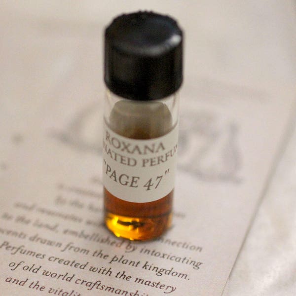 Page 47 Organic Natural Botanical Perfume 1 gram in a tiny vial - A seaside amber fragrance landscaped with jasmine and champa.