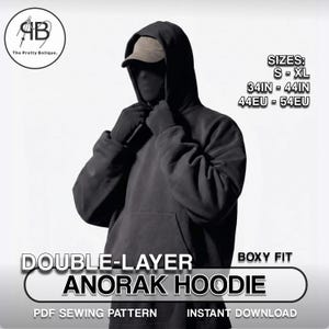May include: A dark gray double-layer anorak hoodie with a boxy fit. The hoodie has a large hood and a front pocket. The text on the image reads "DOUBLE-LAYER ANORAK HOODIE" and "PDF SEWING PATTERN". Sizes are S-XL, 34in-44in.
