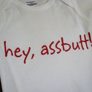 Hey Assbutt Onesie in Red Lettering Supernatural Inspired Baby Shower Funny Gift for Fans of the Tv Show FREE US SHIPPING