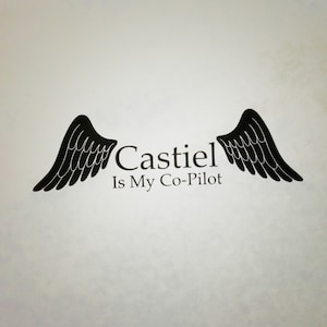 May include: Black and white image of angel wings with the text "Castiel Is My Co-Pilot" underneath.