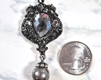 MM-125; Edwardian Antique Silvered Pendant with One Large Faceted Cabochon and Accented with Smokey Crystals and a Grey Faux Pearl Drop