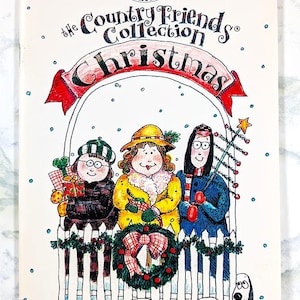 May include: A vintage book cover from "The Country Friends Collection Christmas" series. The cover features three cartoon figures in winter attire, a wreath, and a dog. The book is a collection of ideas and recipes for the holidays.
